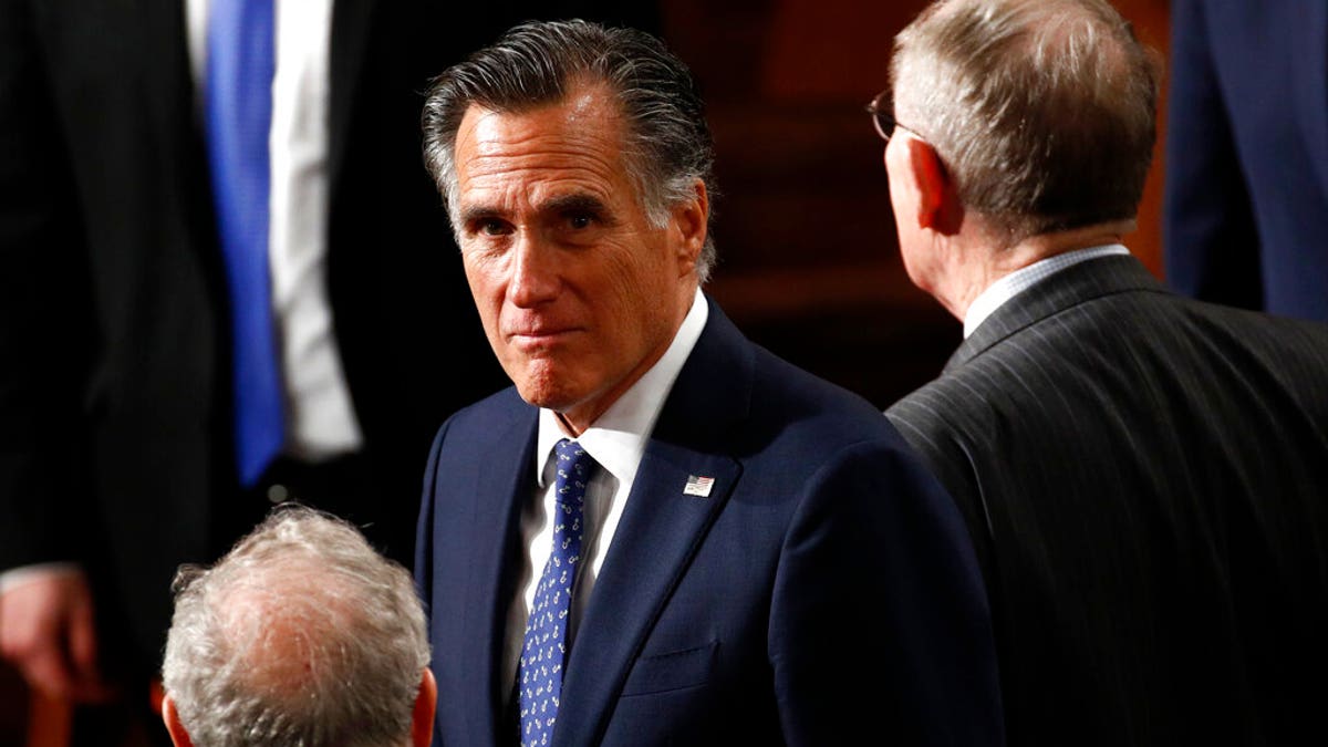 Sen. Mitt Romney, R-Utah, arrives before President Donald Trump delivers his State of the Union address to a joint session of Congress on Capitol Hill in Washington, Tuesday, Feb. 4, 2020. (AP Photo/Patrick Semansky)