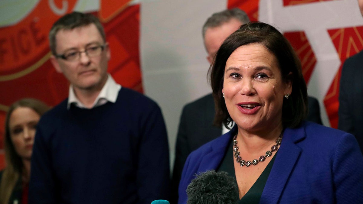 Sinn Féin's President Mary Lou McDonald addresses the media in Dublin, as Sinn Féin's David Cullinane looks on, in Dublin, Ireland, Monday, Feb. 10, 2020.? (Niall Carson/PA via AP)