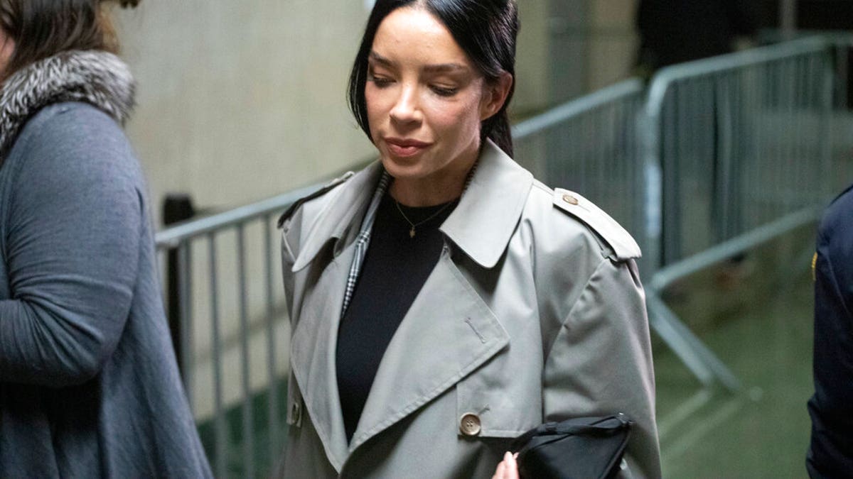 Mexican model Claudia Salinas leaves court after testifying in Harvey Weinstein's rape trial, Monday, Feb. 10, 2020, in New York. (AP Photo/Mark Lennihan)