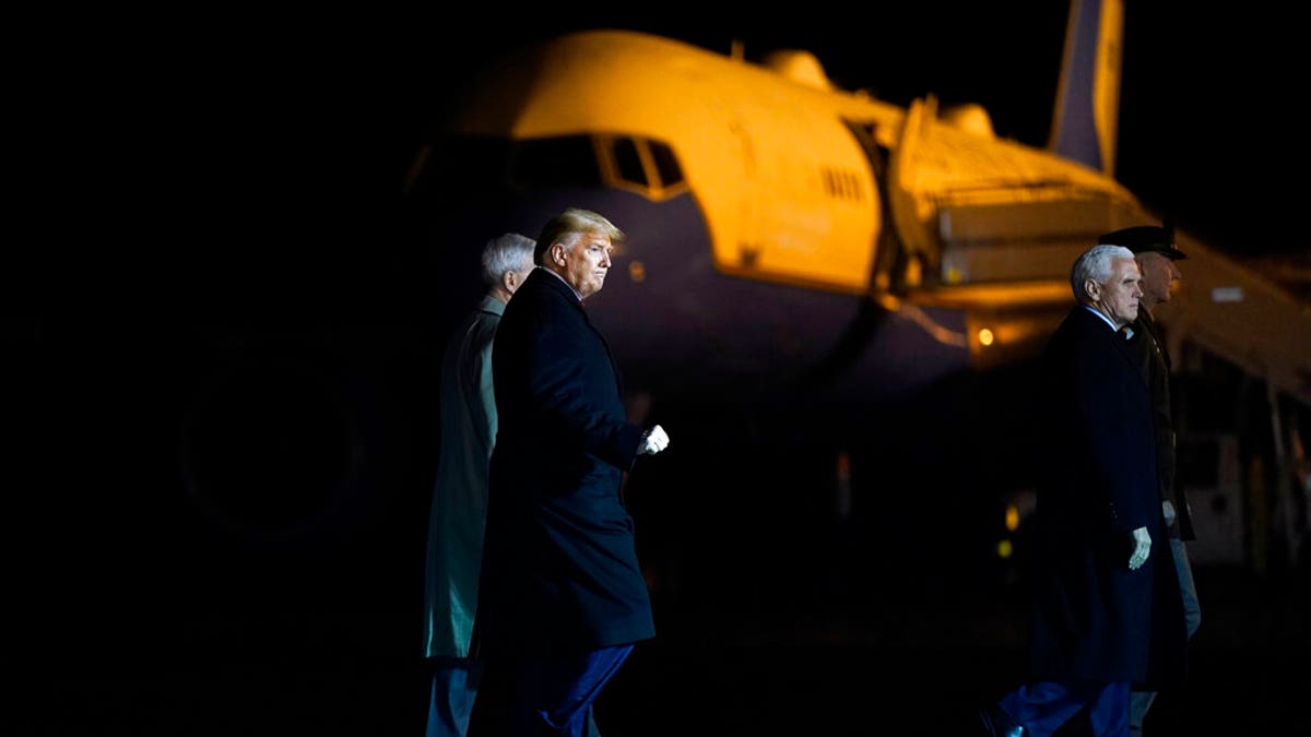 President Donald Trump and Vice President Mike Pence depart after watching a casualty return for Sgt. 1st Class Javier Gutierrez, of San Antonio, Texas and Sgt. 1st Class Antonio Rodriguez, of Las Cruces, N.M., Monday, Feb. 10, 2020, at Dover Air Force Base, Del. According to the Department of Defense both died Saturday, Feb. 8, during combat operations in Afghanistan. (AP Photo/Evan Vucci)