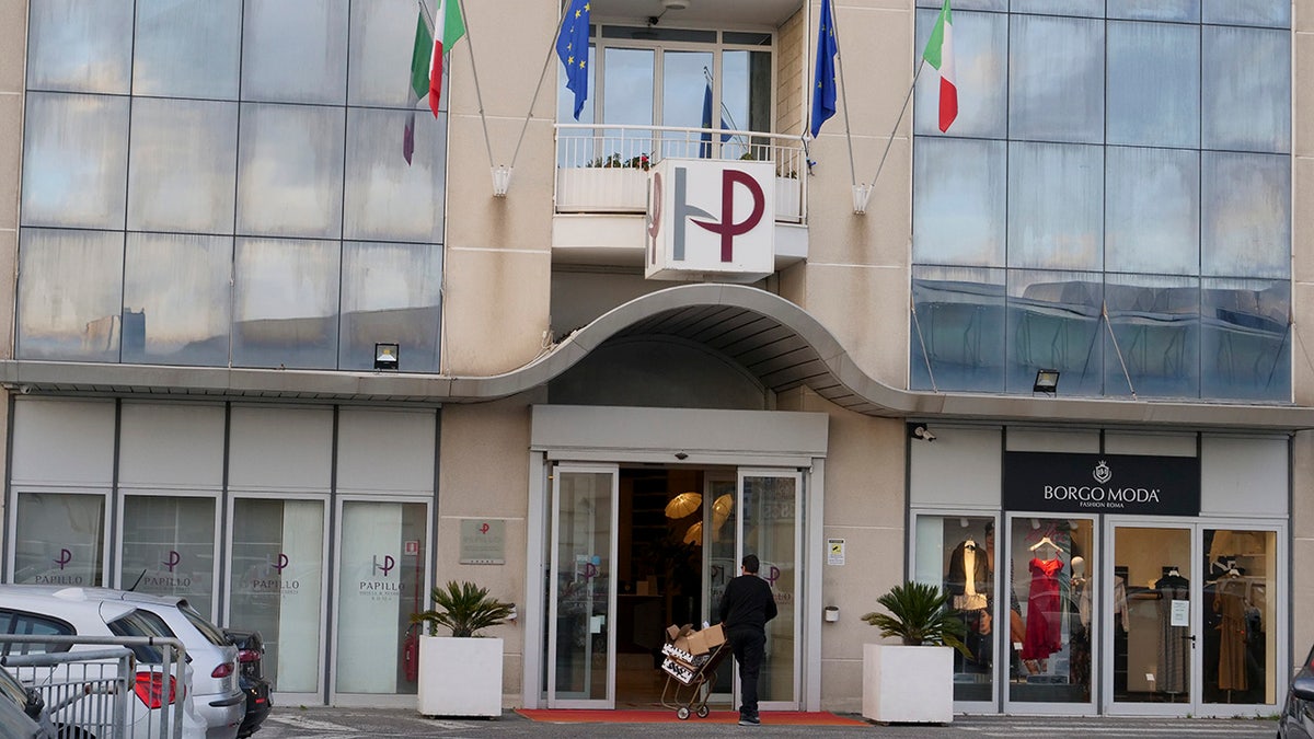 A view of the hotel where an American woman wanted in the 2002 death of her husband was arrested in Rome, Thursday, Feb. 13, 2020. (AP Photo/Paolo Santalucia)