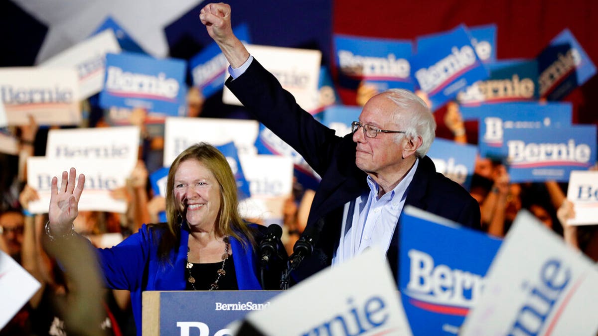 Sanders with his wife Jane, speaks during a campaign event in San Antonio, Saturday, Feb. 22, 2020. (AP Photo/Eric Gay)