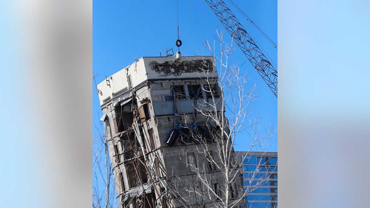 A wrecking ball smashes against the "Leaning Tower of Dallas" north of downtown Dallas, Monday, Feb. 24, 2020. 