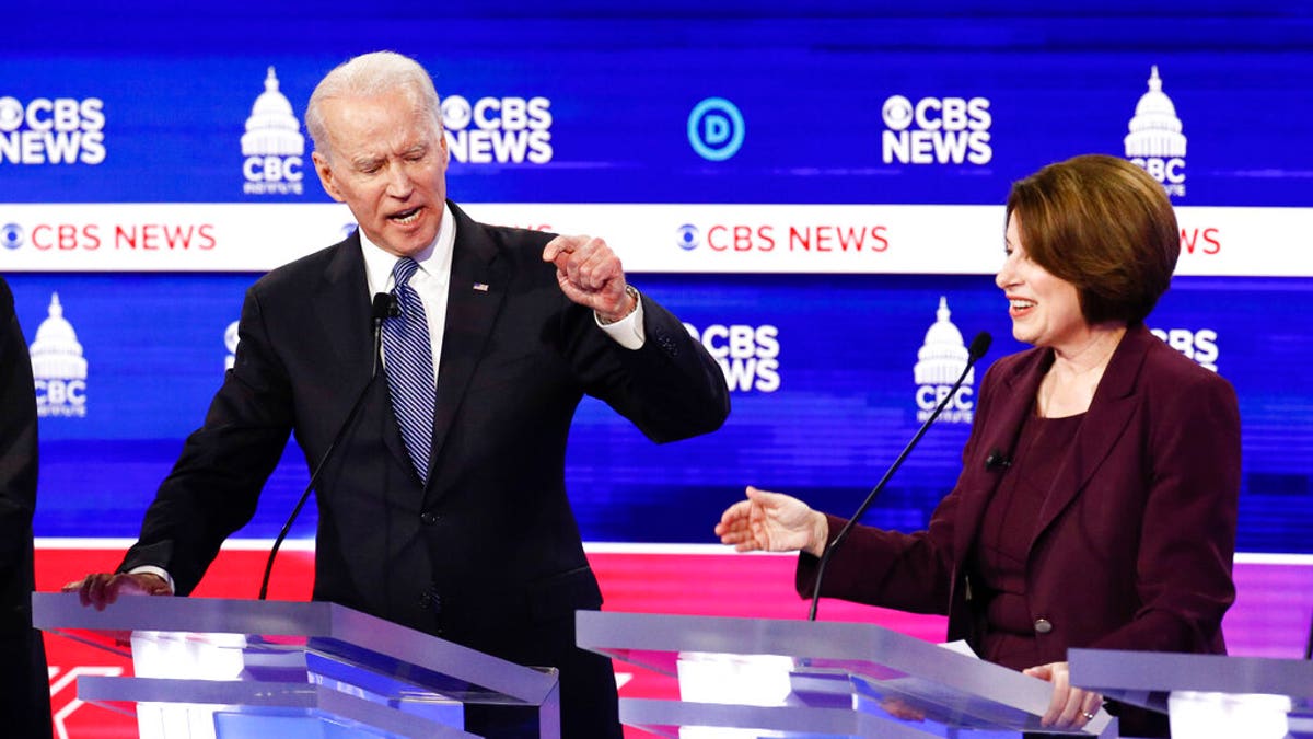 Democratic presidential candidates, former Vice President Joe Biden, left, and Sen. Amy Klobuchar, D-Minn., participate in a Democratic presidential primary debate at the Gaillard Center, Tuesday, Feb. 25, 2020, in Charleston, S.C., co-hosted by CBS News and the Congressional Black Caucus Institute. (AP Photo/Patrick Semansky)