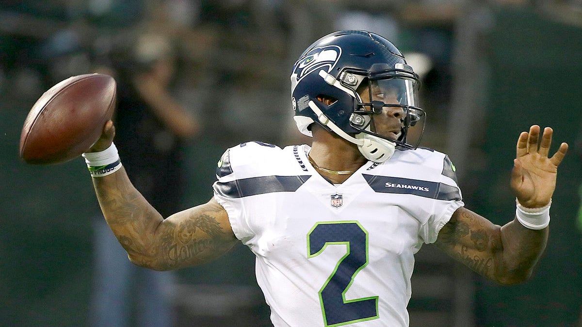 FILE - In this Aug. 31, 2017, file photo, Seattle Seahawks quarterback Trevone Boykin (2) passes against the Oakland Raiders during the first half of an NFL preseason football game in Oakland, Calif. Boykin was sentenced to three years in prison after pleading guilty Wednesday, Feb. 26, 2020, to charges from the 2018 beating of his girlfriend. (AP Photo/Eric Risberg, File)