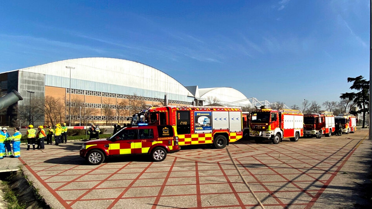 Emergency personnel and firefighters take positions at the Adolfo Suárez-Barajas International Airport in Barajas, outskirts of Madrid, on Monday, Feb. 3.