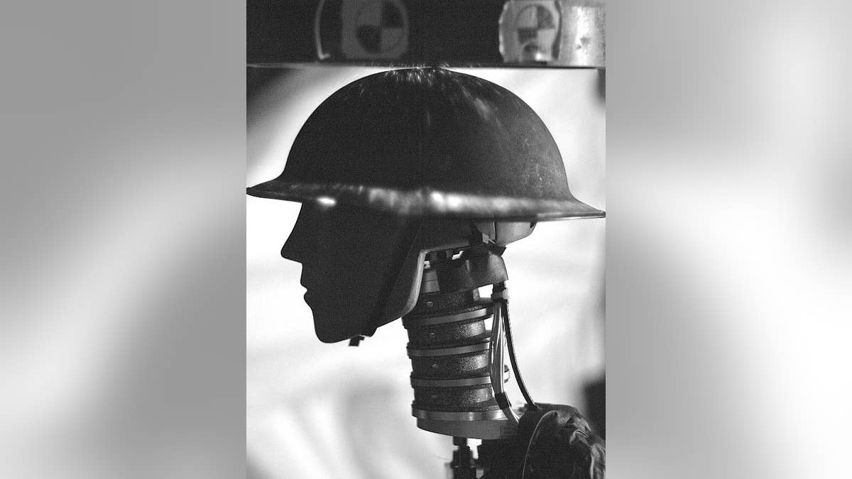 A World War I Brodie helmet that was used by American and British forces in is hit with a shock wave to test how well it protects the dummy underneath from primary blasts.