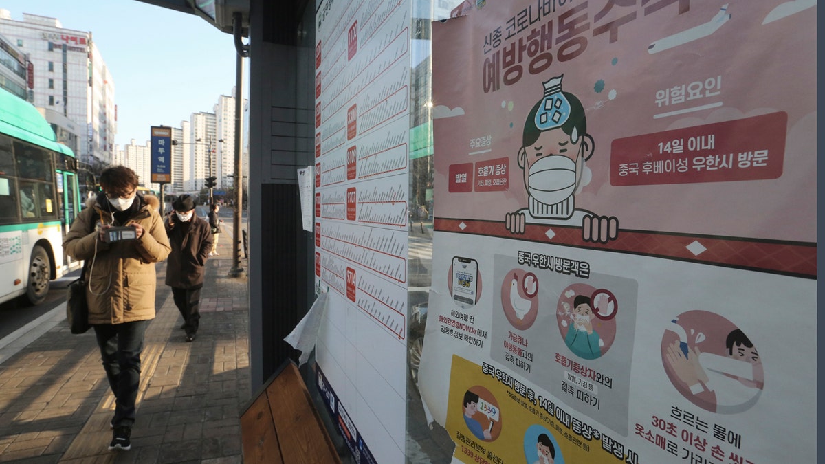 A poster detailing precautions to take against the coronavirus is seen at a bus station in Goyang, South Korea, Sunday, Feb. 23, 2020.