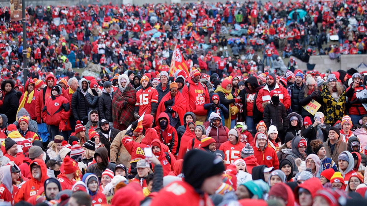 Kansas City Chiefs fans gather for a Super Bowl parade and rally in Kansas City, Mo., Wednesday, Feb. 5, 2020. (AP Photo/Orlin Wagner)