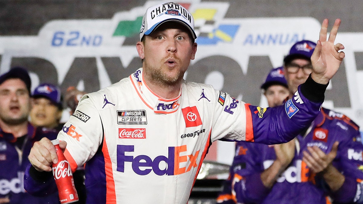 Denny Hamlin celebrates in Victory Lane after winning the NASCAR Daytona 500 auto race at Daytona International Speedway, Monday, Feb. 17, 2020, in Daytona Beach, Fla. (AP Photo/John Raoux)