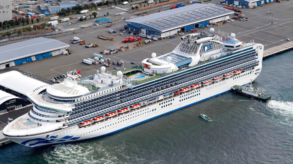 The Diamond Princess, seen here anchored at Yokohama Port on Feb. 6, has so far reported 20 cases of the coronavirus among passengers and crew.