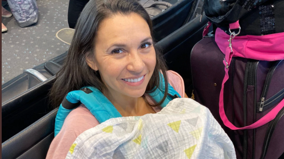 Caren Moore and their new baby, pictured.