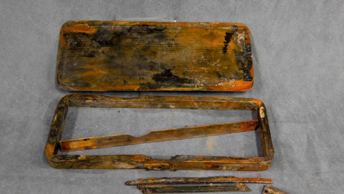 The pencil case was discovered in a drawer in what is believed to be the Captain's Steward's pantry. (Parks Canada)