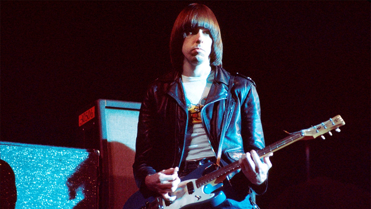 Johnny Ramone (John Cummings) (1948 - 2004) of The Ramones performs on stage at The Roundhouse, London, July 1976.