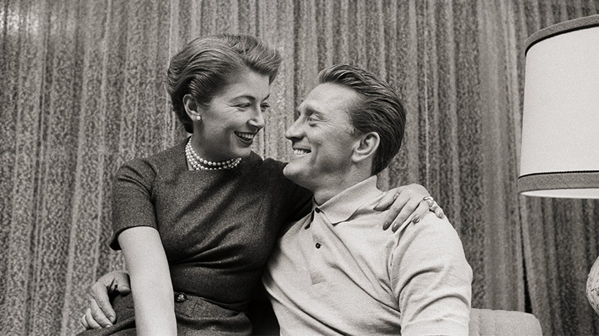 Actor Kirk Douglas and his wife Anne remained devoted to each other, pal claims.
