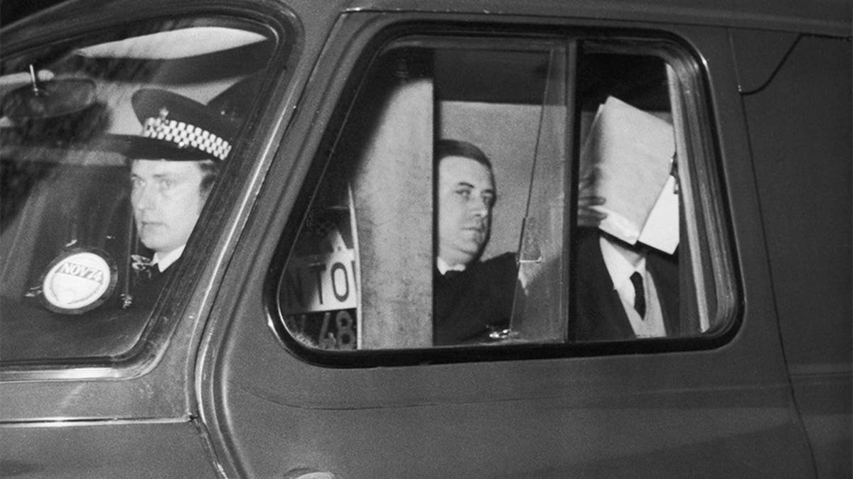 Ian Ball covers his face as he arrives for an appearance at Bow Street Court, London, March 1974. Ball is charged with the attempted murder of Princess Anne's private detective, Inspector James Beaton, during a failed attempt to kidnap the princess in Pall Mall, London a week earlier.