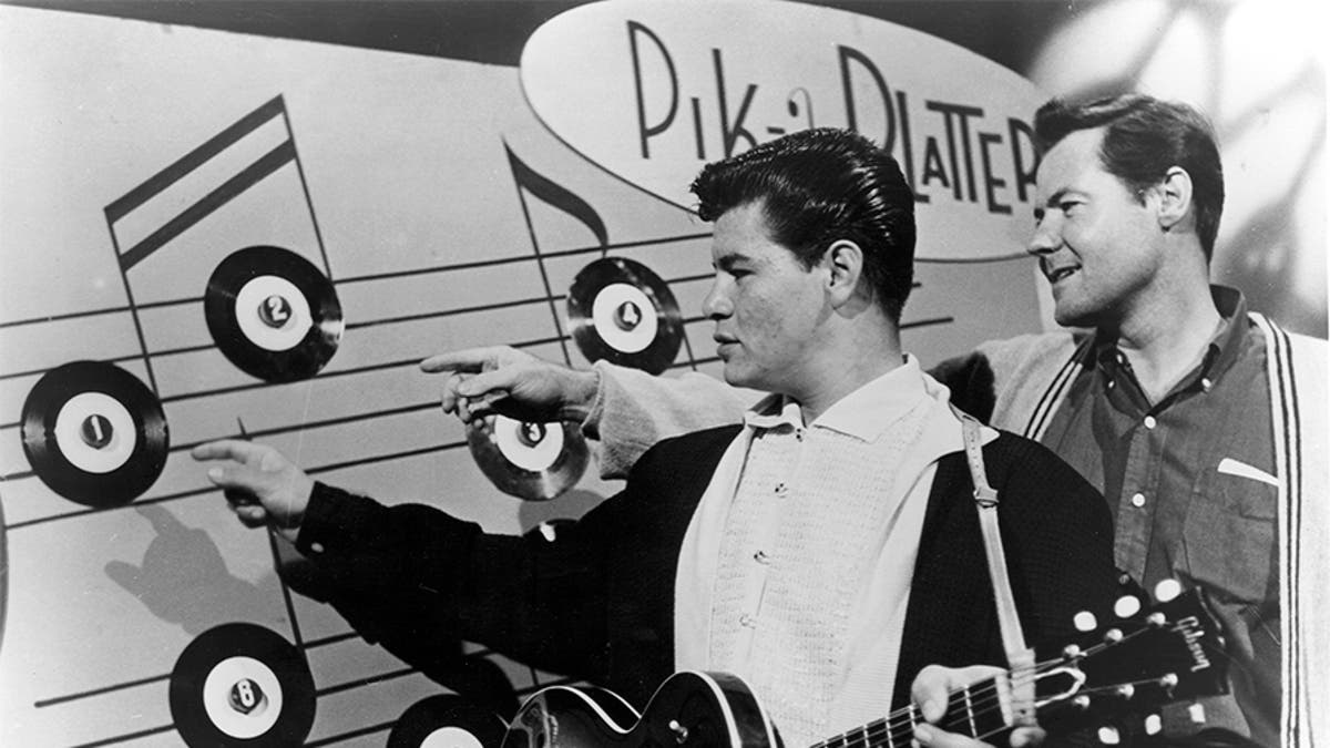 Ritchie Valens (Richard Steven Valenzuela) and president of Del-Fi Records Bob Keane on a TV show in 1958 in Los Angeles, California.