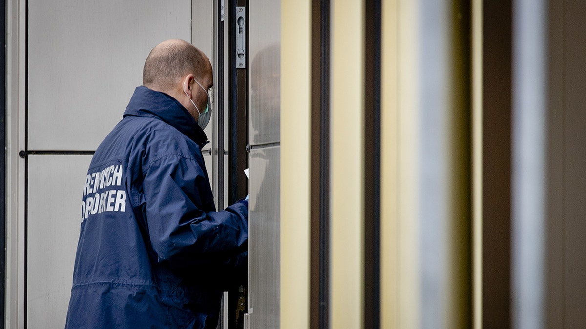 Emergency services stand outside a postal sorting company after a bomb letter is believed to have detonated in the mailroom in the southern city of Kerkrade on February 12, 2020. (Photo by Sem VAN DER WAL / ANP / AFP) / Netherlands OUT (Photo by SEM VAN DER WAL/ANP/AFP via Getty Images)