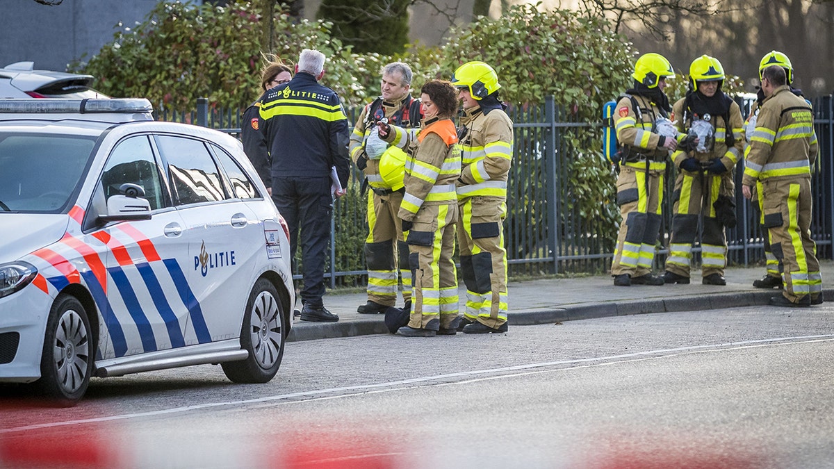 Emergency services stand outside a postal sorting company after a bomb letter is believed to have detonated in the mailroom in the southern city of Kerkrade on February 12, 2020. (Photo by MARCEL VAN HOORN/ANP/AFP via Getty Images)