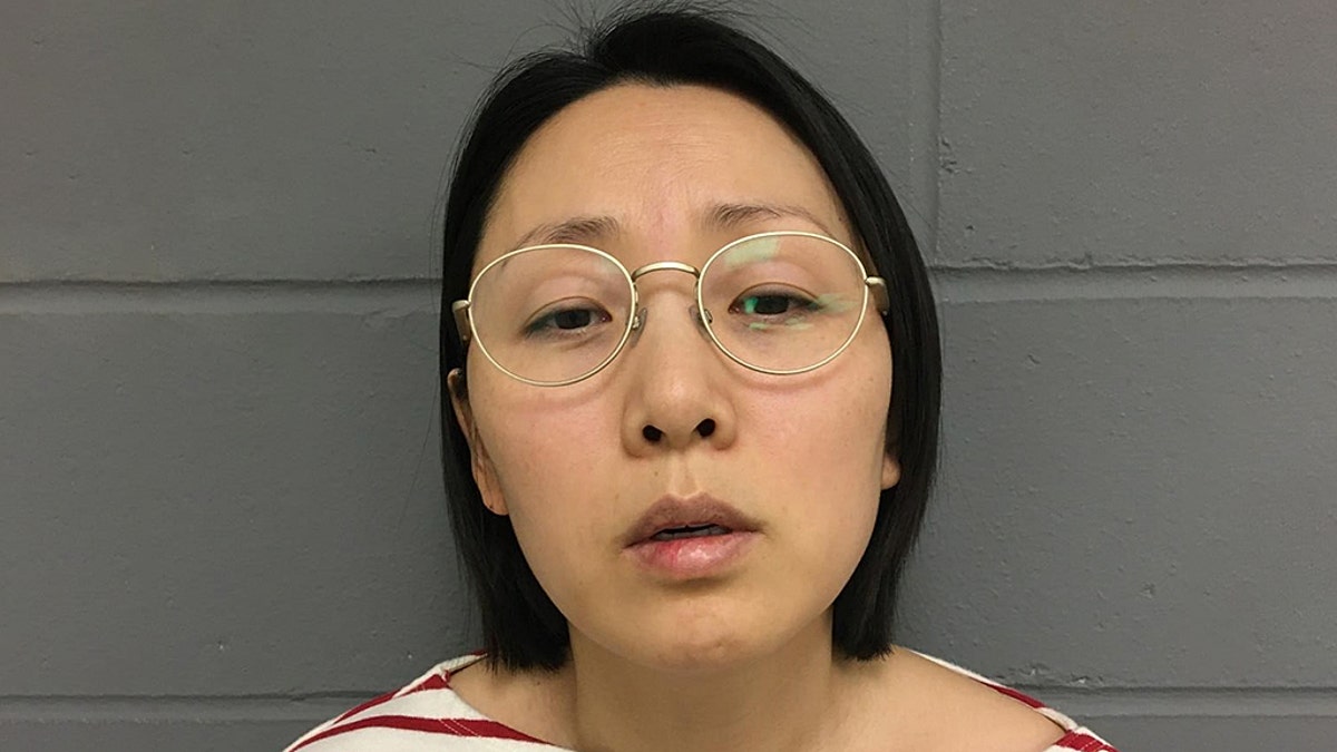 This undated photo provided by the West Des Moines, Iowa Police Department shows Gowun Park. Park was charged with first-degree murder and first-degree kidnapping in the death of her husband, Sung Nam. Park was arrested Wednesday. (West Des Moines Police Department via AP)