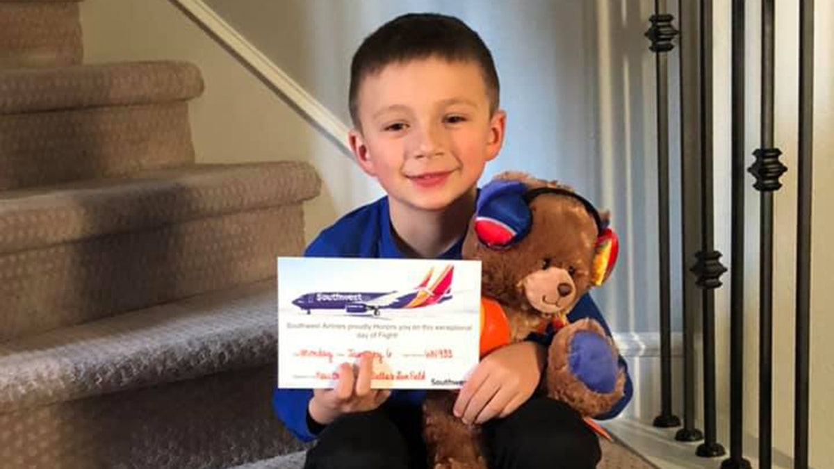 Grayson, pictured here with his new friend "Jack," had earlier lost his favorite teddy bear on a Southwest Airlines flight.