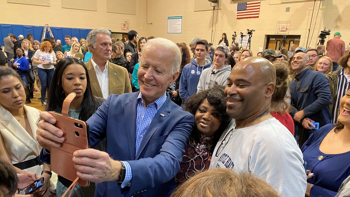 Former Vice President Joe Biden takes selfies with voters at a town hall in Conway, S.C., on Feb. 27, 2020. (Fox News)
