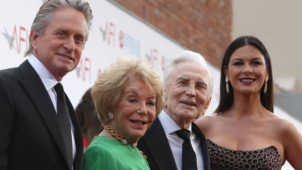 Actors Michael Douglas, Anne Buydens, Kirk Douglas and Catherine Zeta-Jones arrive at AFI Lifetime Achievement Award: A Tribute to Michael Douglas held at Sony Pictures Studios on June 11, 2009.