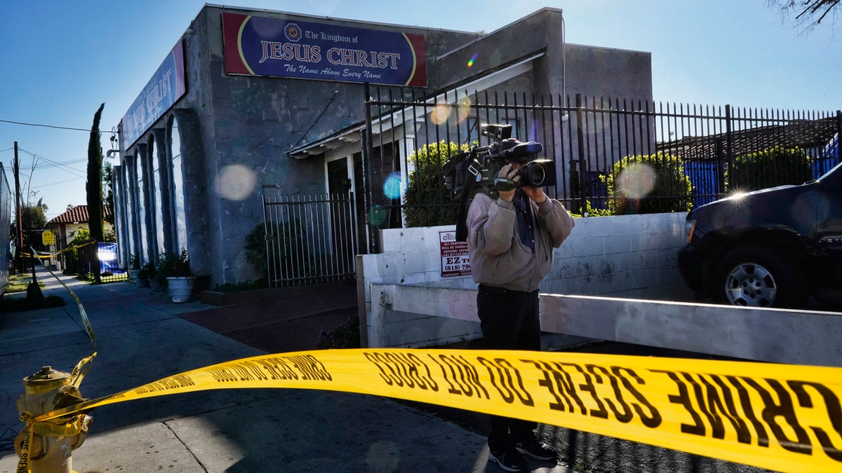 In this Wednesday, Jan. 29, 2020, file photo, crime scene tape is seen closing off an area around the grounds of the Kingdom of Jesus Christ Church in the Van Nuys section of Los Angeles.  (AP Photo/Richard Vogel, File)