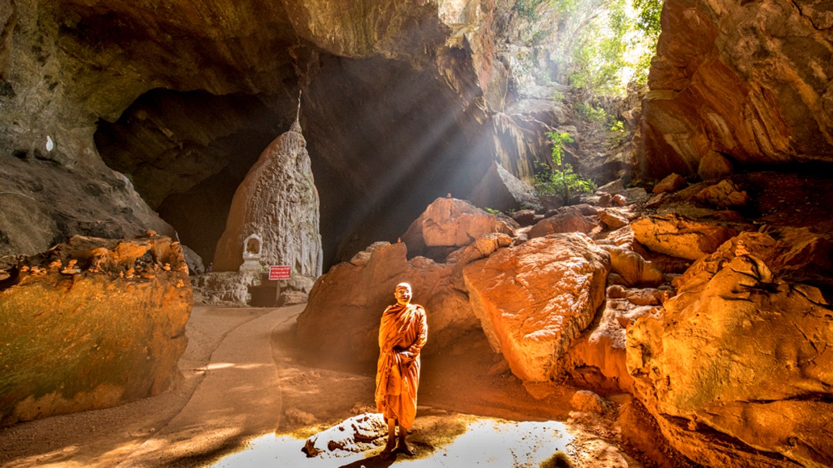 A Buddhist monk in Mahar Sadan Cave, in southern Myanmar.