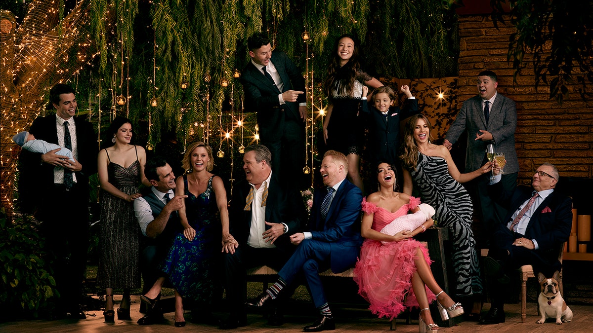 The 'Modern Family' cast poses for a group shot as the show is set to end in April after 11 seasons.