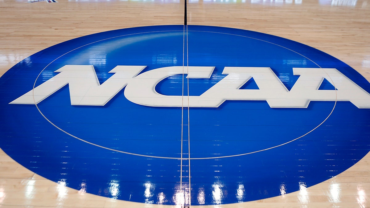 NCAA logo on basketball court