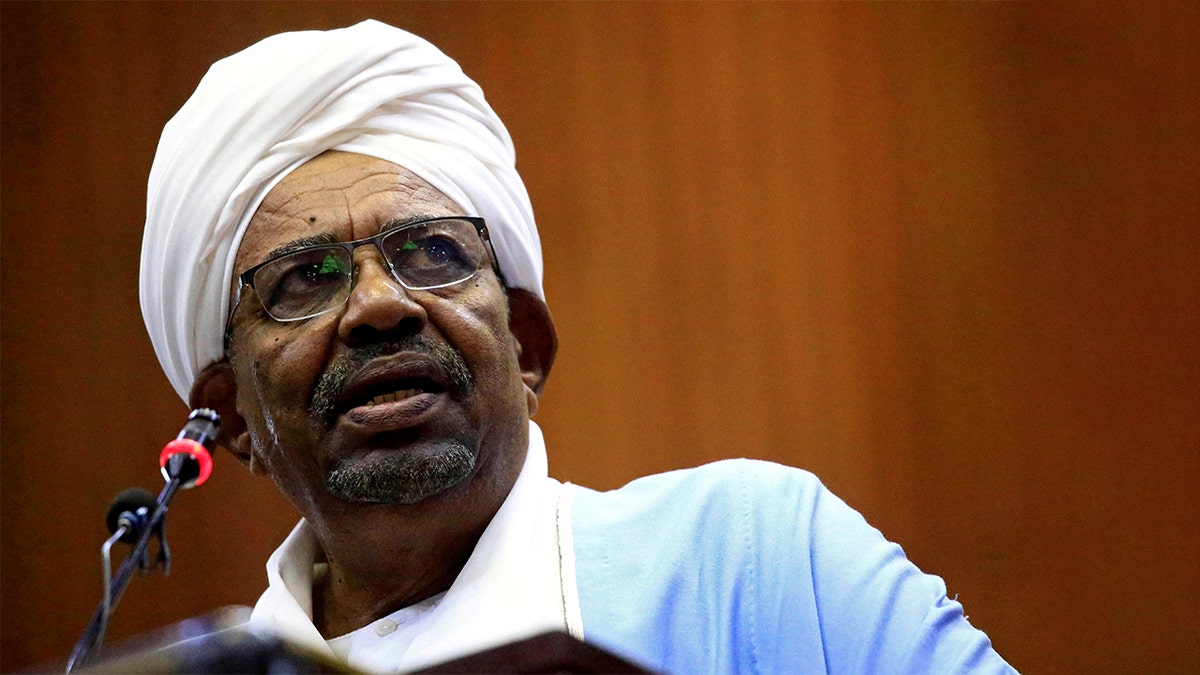 Omar al-Bashir delivering a speech inside Parliament in Khartoum, Sudan, in April 2019.