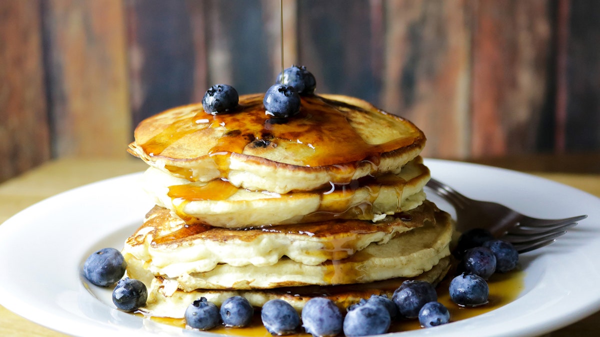 stack of pancakes with fruit