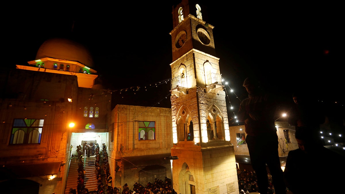 Palestinians perform the Fajr (Dawn) prayers outside Al-Nasir mosque in Nablus, in the Israeli-occupied West Bank February 14, 2020. Picture taken February 14, 2020. REUTERS/Raneen Sawafta - RC2Z2F9J0MKU