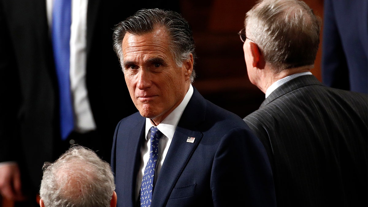 Sen. Mitt Romney, R-Utah, arrives before President Donald Trump delivers his State of the Union address to a joint session of Congress on Capitol Hill in Washington, Tuesday, Feb. 4, 2020. (AP Photo/Patrick Semansky)