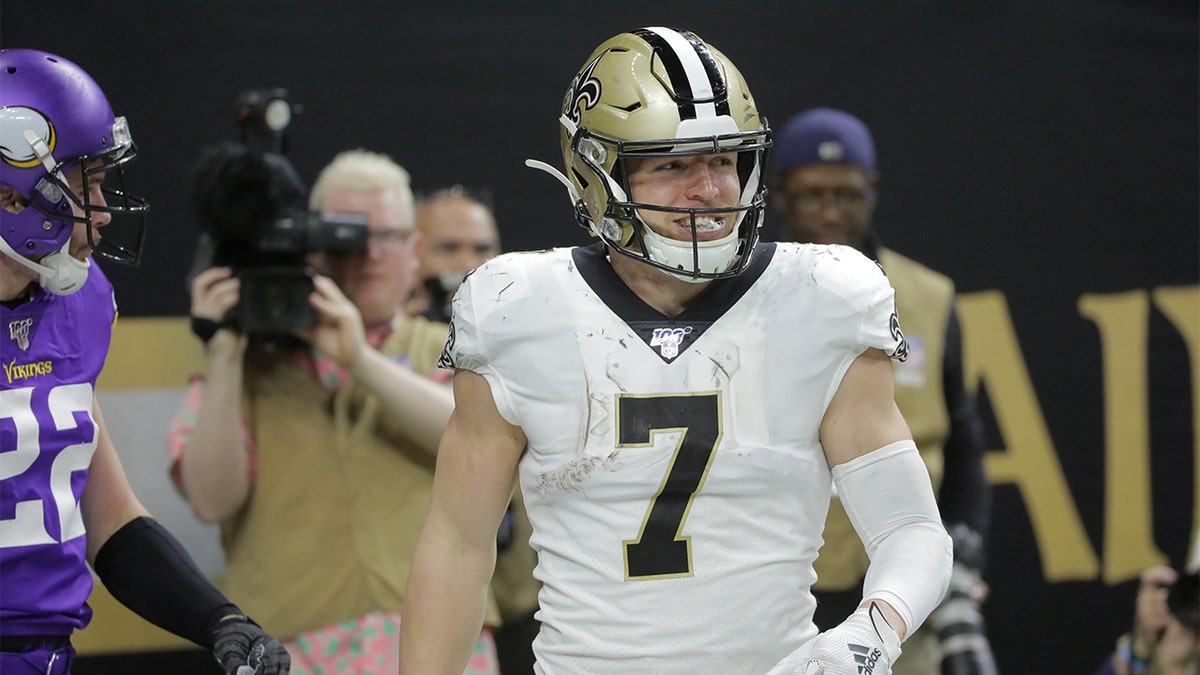 New Orleans Saints quarterback Taysom Hill (7) reacts after catching a pass for a touchdown against the Minnesota Vikings during the fourth quarter of a NFC Wild Card playoff football game at the Mercedes-Benz Superdome on Jan 5, 2020.