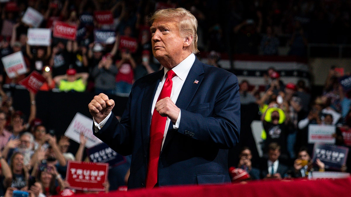 President Donald Trump arrives to speak at a campaign rally at Veterans Memorial Coliseum, Wednesday, Feb. 19, 2020, in Phoenix. (AP Photo/Evan Vucci)