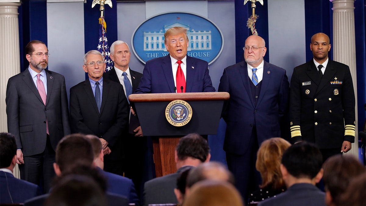 President Donald Trump speaks about the coronavirus in the press briefing room at the White House, Feb. 29, in Washington as Health and Human Services Secretary Alex Azar, National Institute for Allergy and Infectious Diseases Director Dr. Anthony Fauci, Vice President Mike Pence, Robert Redfield, director of the Centers for Disease Control and Prevention and U.S. Surgeon General Dr. Jerome Adams listen. (AP Photo/Carolyn Kaster)