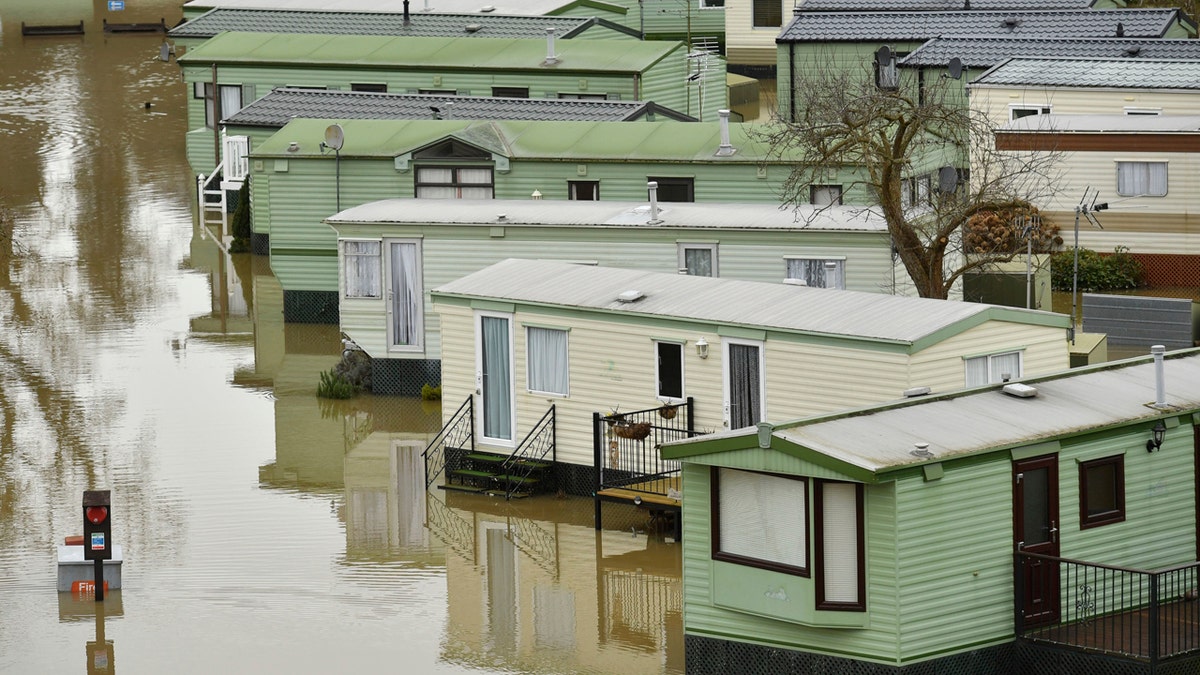 The Riverside Caravan Park is inundated by flood water after heavy rains breached the nearby river Severn and normal watercourses in the area of Bridgnorth, England, Wednesday Feb. 19, 2020.