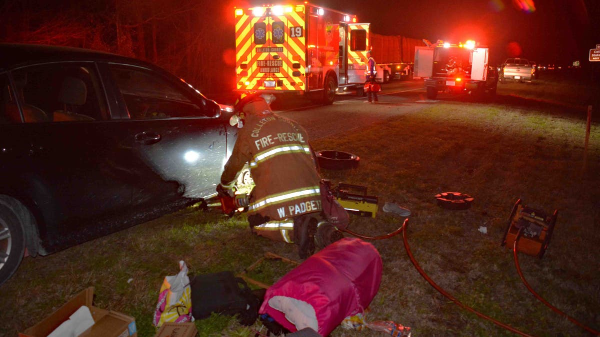 Fire crews deployed a Holmatro Hydraulic Spreader to lift the car and free her