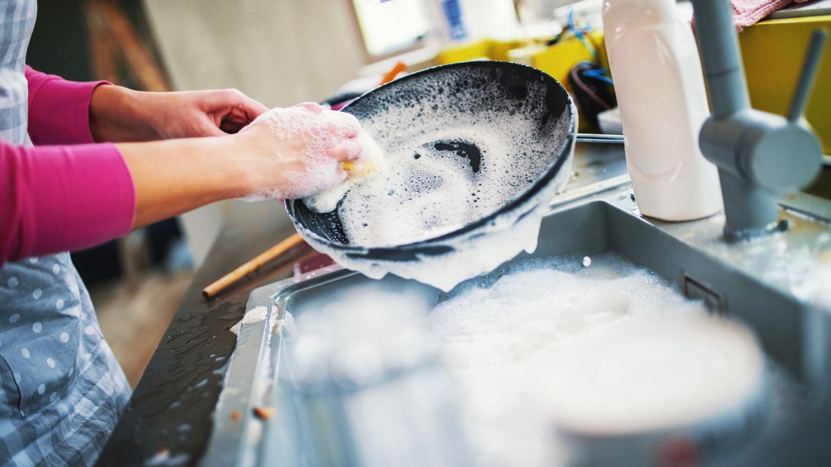 Woman doing dishes