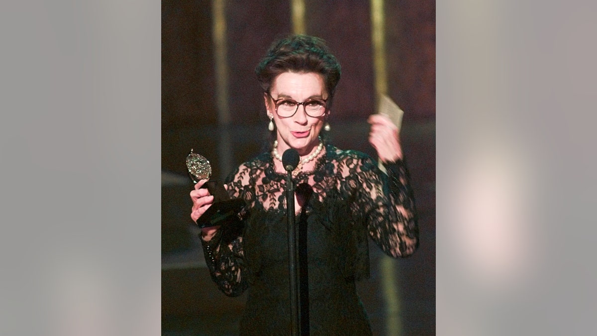 Zoe Caldwell holds her award for Leading Actress in a Play for her role in "Master Class" at the 50th Annual Tony Awards in New York. 