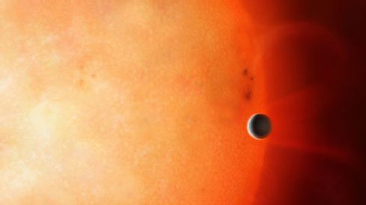 Artist’s impression of a hot Jupiter orbiting close to a star. (Credit: University of Warwick/Mark Garlick)