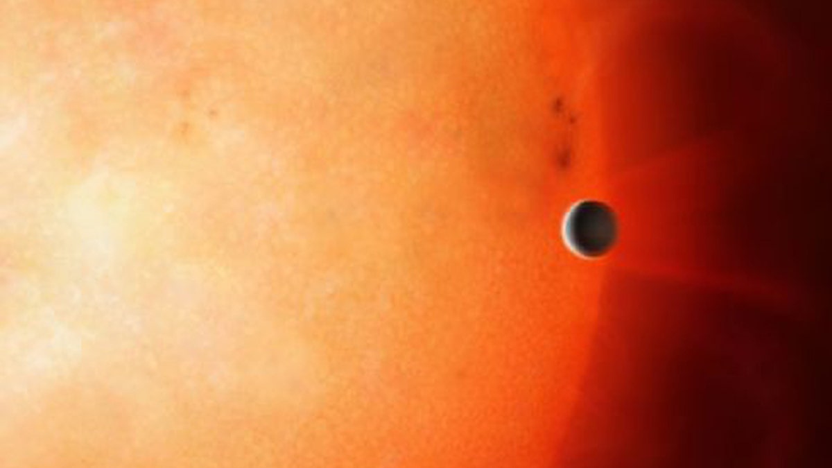 Artist’s impression of a hot Jupiter orbiting close to a star. (Credit: University of Warwick/Mark Garlick)