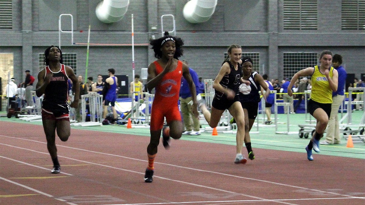 Terry Miller, second from left, and Andraya Yearwood, far left