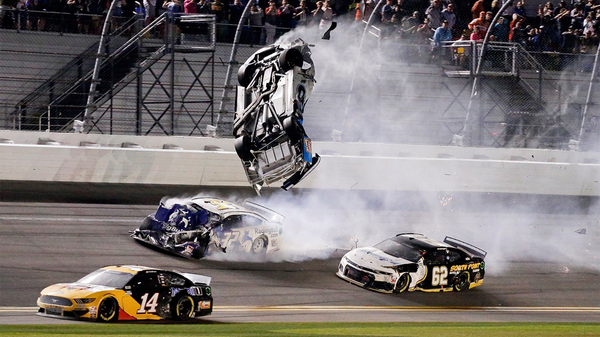 Ryan Newman, top center, went airborne in the final lap of the race. (AP Photo/Terry Renna)