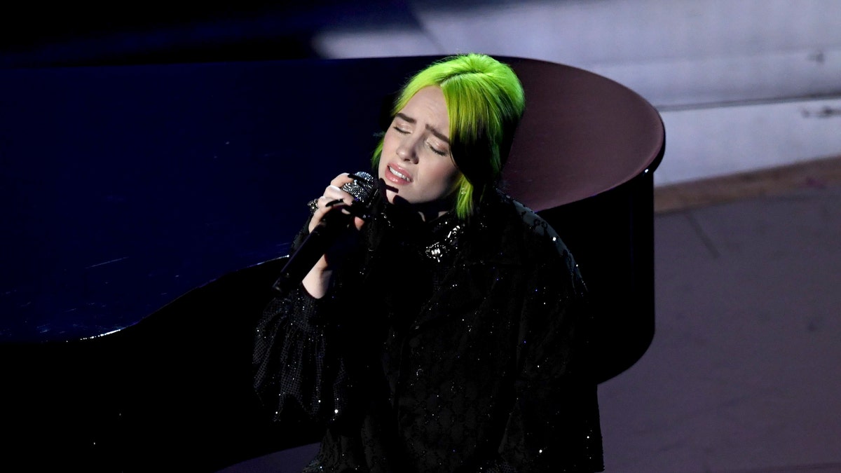 Billie Eilish performs onstage during the 92nd Annual Academy Awards.