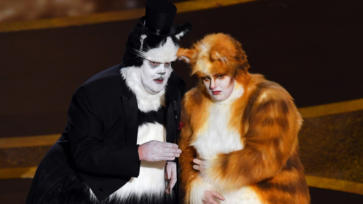 The audience erupted in laughter as James Corden and Rebel Wilson took the stage in full cat suits.