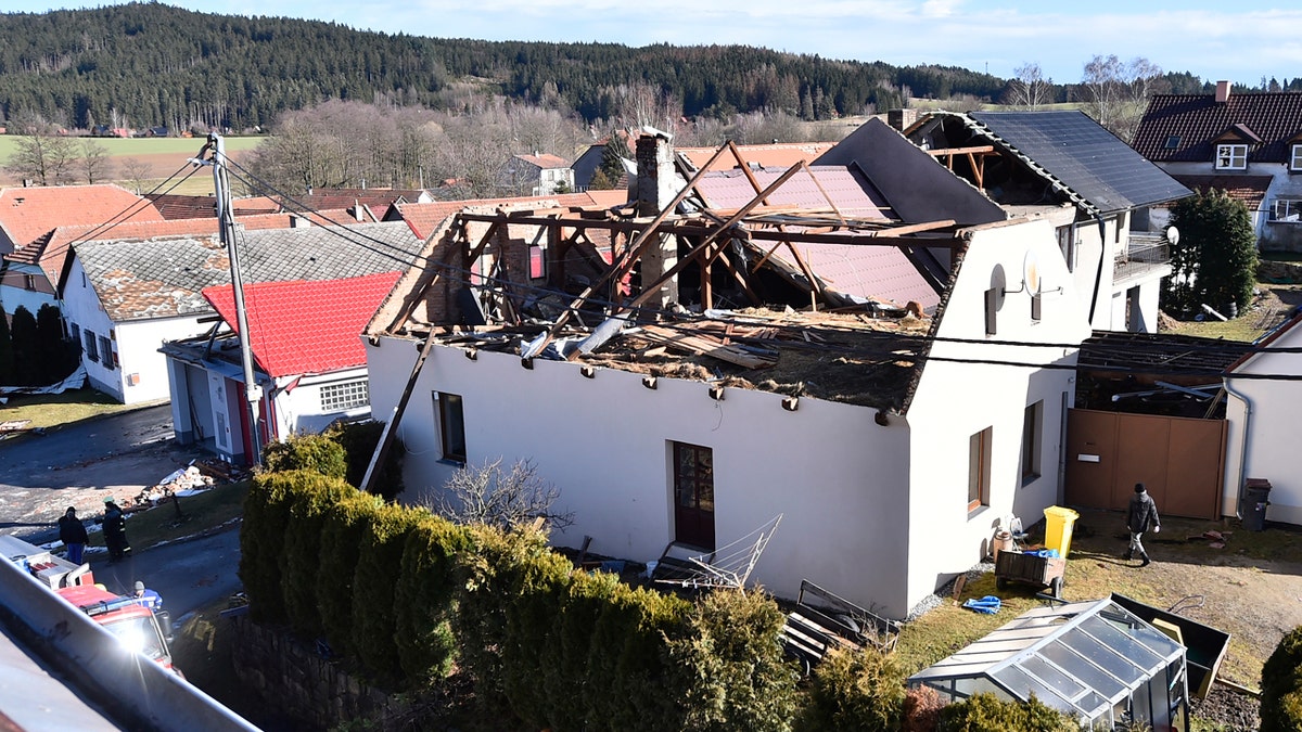 The roof of a house is damaged due to a strong storm in Rohozna, Czech Republic, Monday, Feb. 10, 2020.