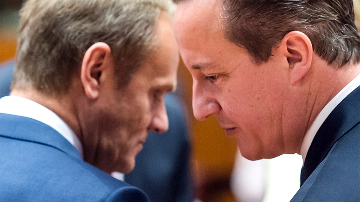 European Council President Donald Tusk, left, speaks with British Prime Minister David Cameron during a summit of EU leaders in Brussels in 2015. (AP)